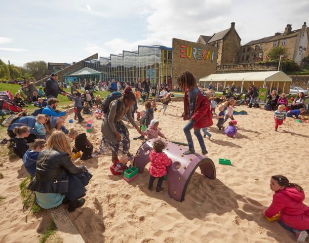 Playing in the Eureka! sand pit